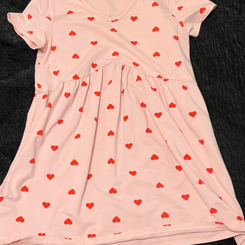 Pink “smitten” babydoll dress with hearts from My Violet